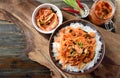 Stir fried kimchi with pork on cooked rice in a bowl Royalty Free Stock Photo