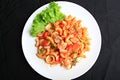 Stir-fried Macaroni with Seafood with Tomato Cream Sauce on white plate, Royalty Free Stock Photo