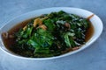 Stir-fried malindjo leaves with dried shrimp on the table Royalty Free Stock Photo