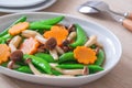 Stir fried mixed vegetables on plate, Vegetarian food Royalty Free Stock Photo