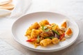 Stir Fried Pasta with squid and Salted Egg Yolk.Thai style fusion food Royalty Free Stock Photo