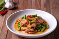 Stir fried pork belly and red curry paste with sting bean Royalty Free Stock Photo