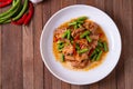 Stir fried pork belly and red curry paste with sting bean Royalty Free Stock Photo