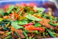 Stir-fried pork with chili paste, bergamot leaves, and yardlong bean. Beef stir fried with variety of vegetables for serve in the Royalty Free Stock Photo