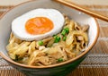 Stir-Fried Pork with Onions Butadon over Rice topped with Sunny Side Up Egg Royalty Free Stock Photo