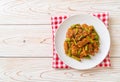 Stir fried pork and red curry paste with sting bean Royalty Free Stock Photo