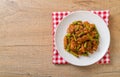 Stir fried pork and red curry paste with sting bean Royalty Free Stock Photo