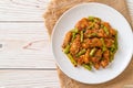 Stir fried pork and red curry paste with sting bean Royalty Free Stock Photo