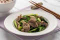 Stir fried pork slices with Chinese kale Royalty Free Stock Photo