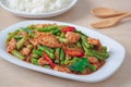 Stir fried pork with yard long bean and red curry paste served with rice, Thai food Royalty Free Stock Photo