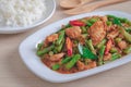 Stir fried pork with yard long bean and red curry paste served with rice, Thai food Royalty Free Stock Photo