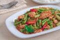 Stir fried pork with yard long bean and red curry paste served with rice, Thai food Royalty Free Stock Photo