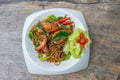 Stir-Fried Prawn Spaghetti with Herbs Thai local food in a white dish