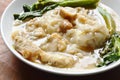 Stir fried rice noodle with bass fish and Chinese kale in gravy sauce on plate Royalty Free Stock Photo