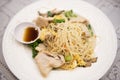 Stir fried rice vermicelli with pork egg and chinese kale, cooked noodles pork vegetable and sauce on white plate on the dining Royalty Free Stock Photo