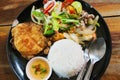 Stir fried sea food with red and green peppers and steamed rice with fried egg Royalty Free Stock Photo