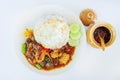 Stir fried seafood in thai red curry paste with rice and fried egg , Spicy Fried seafood , Curry fried shrimps and cooked rice in Royalty Free Stock Photo