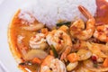 Stir fried shrimp in thai red curry paste with rice and fried Royalty Free Stock Photo