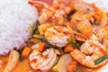 Stir fried shrimp in thai red curry paste with rice and fried Royalty Free Stock Photo
