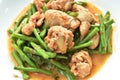 Stir fried slice yarg long bean with chicken curry sauce on plate Royalty Free Stock Photo