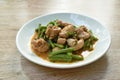 Stir fried slice yarg long bean with chicken curry sauce on plate Royalty Free Stock Photo