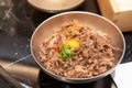 stir-fried sliced pork with sweet sauce topped on Japanese rice topping with a quill egg Royalty Free Stock Photo