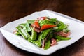 Stir-fried smoked pork with peas