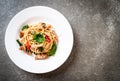 stir-fried spaghetti with chicken and basil