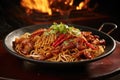 stir-fried spicy noodles with chicken and vegetables on black background, Experience a flaming spice sensation with sizzling stir-