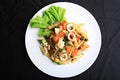 Stir Fried Spicy spaghetti with mixed seafood and herb on white plate Royalty Free Stock Photo