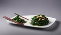 Stir-Fried Spinach with Garlic with chopsticks Royalty Free Stock Photo