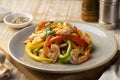 Stir Fried Sweet Peppers with shrimp,Stir fry shrimps and sliced red green and yellow bell pepper Royalty Free Stock Photo