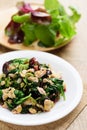 Stir fried Thai spinach with egg on white dish Royalty Free Stock Photo