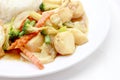 Stir Fried Tofu in Chinese Style,Deep Fried Tofu with Gravy Sauce ,Stir fried tofu with mixed vegetables in white plate on white Royalty Free Stock Photo