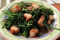 Stir-fried vegetable fern in oyster sauce with crispy Pork