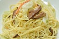 Stir fried vegetarian noodle with mushroom and cabbage on dish