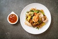 Stir-fried vermicelli with vegetables and seafood  in sukiyaki sauce Royalty Free Stock Photo