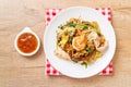 Stir-fried vermicelli with vegetables and seafood  in sukiyaki sauce Royalty Free Stock Photo