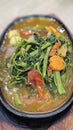 Stir-fried water spinach with quail eggs and seafood Royalty Free Stock Photo