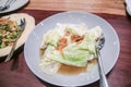 Stir Fry Cabbage, stir-fried cabbage with fish sauce on white plate