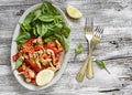 Stir fry of chicken breast and sweet red pepper and fresh spinach