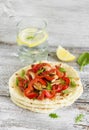 Stir fry of chicken breast and sweet red peppers on homemade tortillas Royalty Free Stock Photo