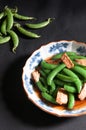 Stir fry gren peas with crunchy frie tofu - Asian cuisine