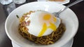 stir fry noodle runny egg spicy indonesian style Royalty Free Stock Photo