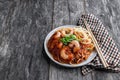Stir fry noodles with shrimps and vegetables on wooden table Royalty Free Stock Photo