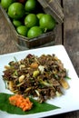 Stir fry Spilt Gill Fungus with white chillies and local onion. Royalty Free Stock Photo