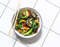 Stir fry vegetables in asian style. Quickly roasted wok vegetables - bok choy, eggplant, bell pepper, zucchini on a light Royalty Free Stock Photo