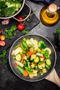 Stir Fry Vegetables on Pan. Healthy Eating and Dieting at Home. Dark Tones Image. Top Down View