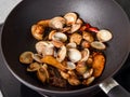 Stir-frying Ginger and clams at high heat to bring forth the savory aroma with sesame oil
