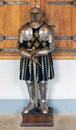 Medieval room of Stirling Castle with harness and decorations